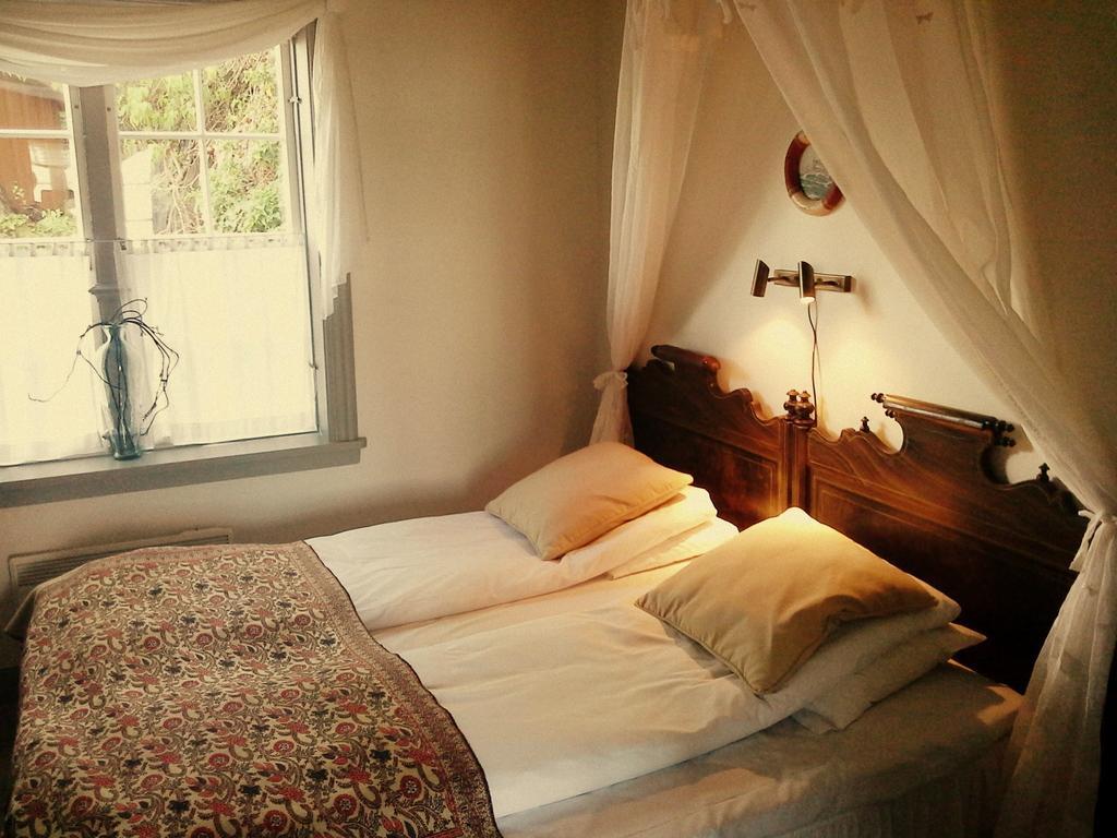 Det Lille Hotel Risor Ruang foto